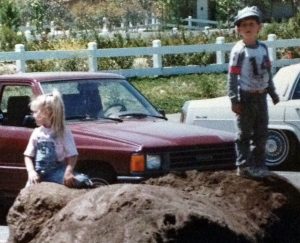 4‑year‑old twins playing on "mulch hill" in January, 1991.